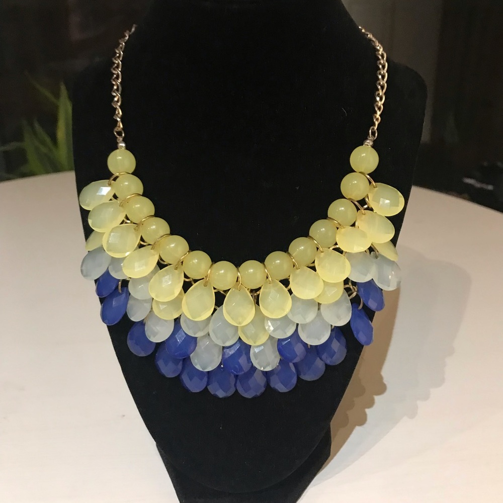 Jcrew statement necklace with blue and yellow tear drop pendants.
